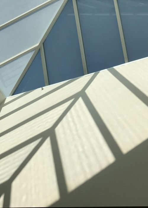 Geometric patterns and shadows from an abstract skylight in a building